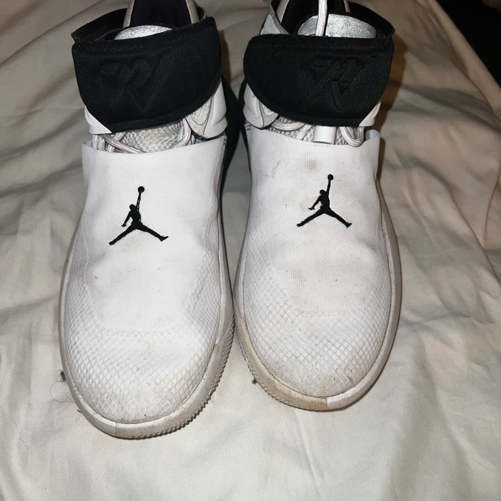 White and Black Jordan Sneakers